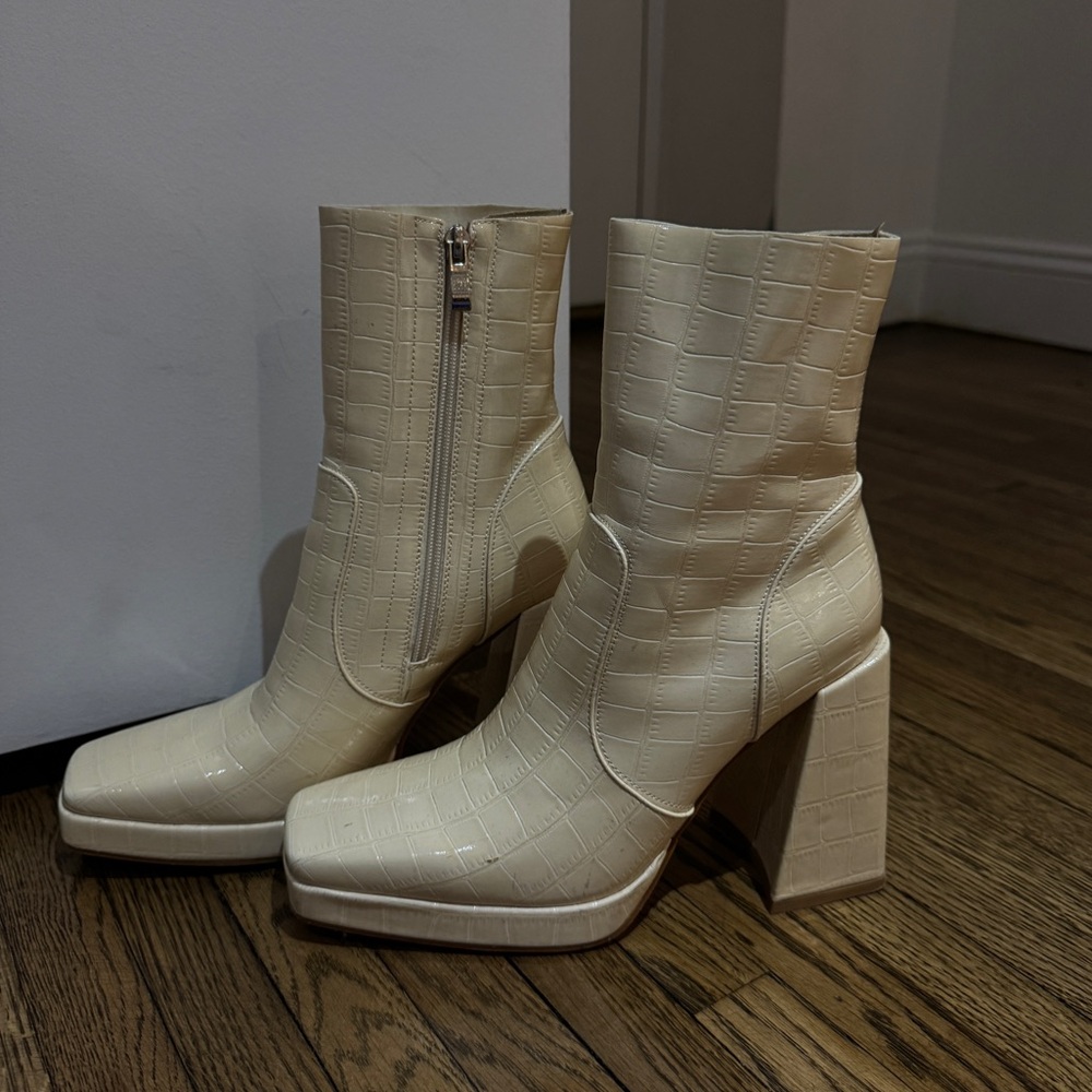 Cream platform heel booties